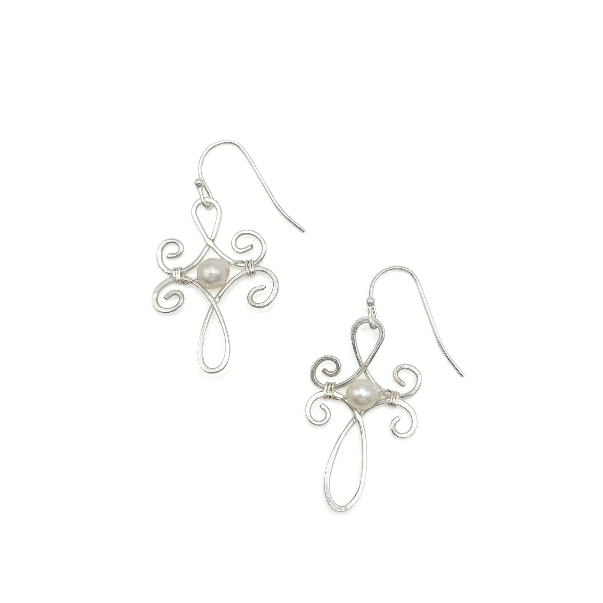 Pearl silver intricate cross earrings