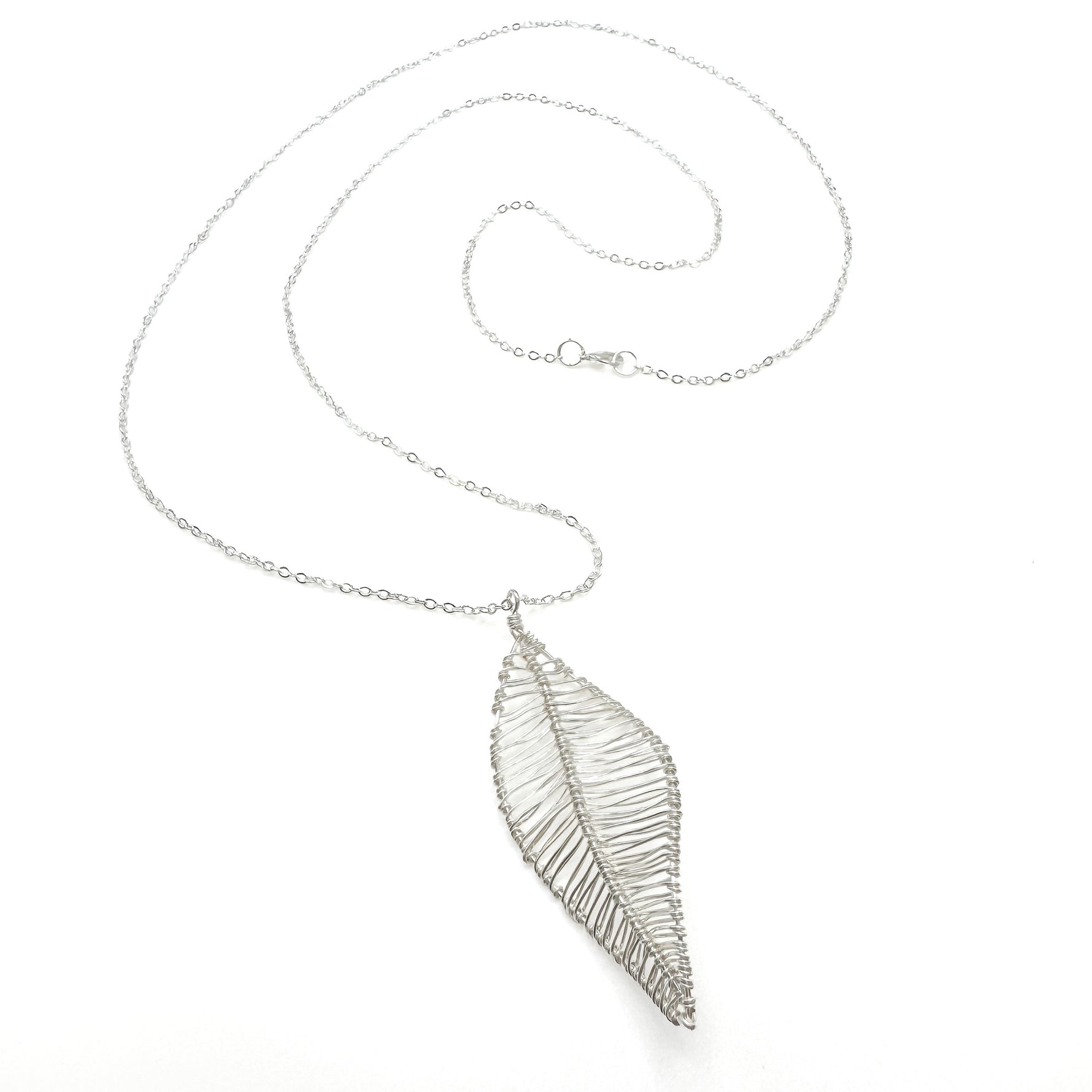 Silver long necklace with wire-wrapped leaf pendant