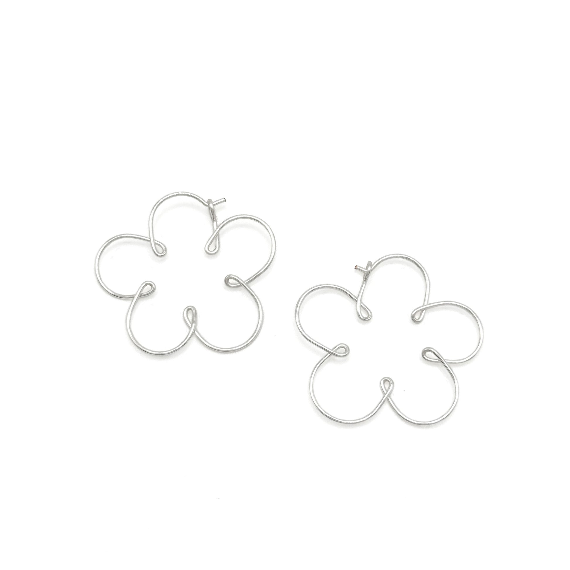 Silver flower buttercup hoop earrings