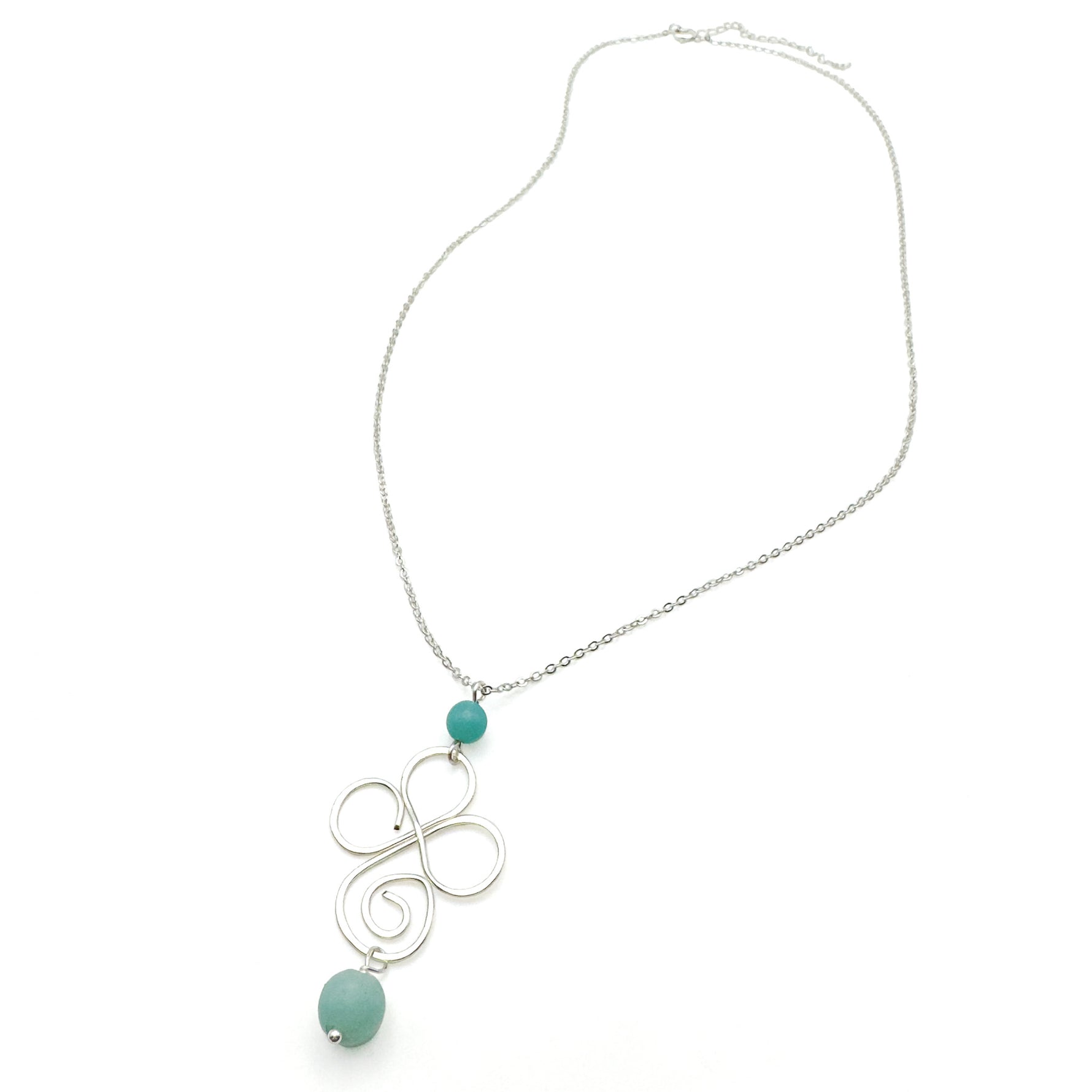 Silver necklace with wire cross and aquamarine amazonite stone pendant
