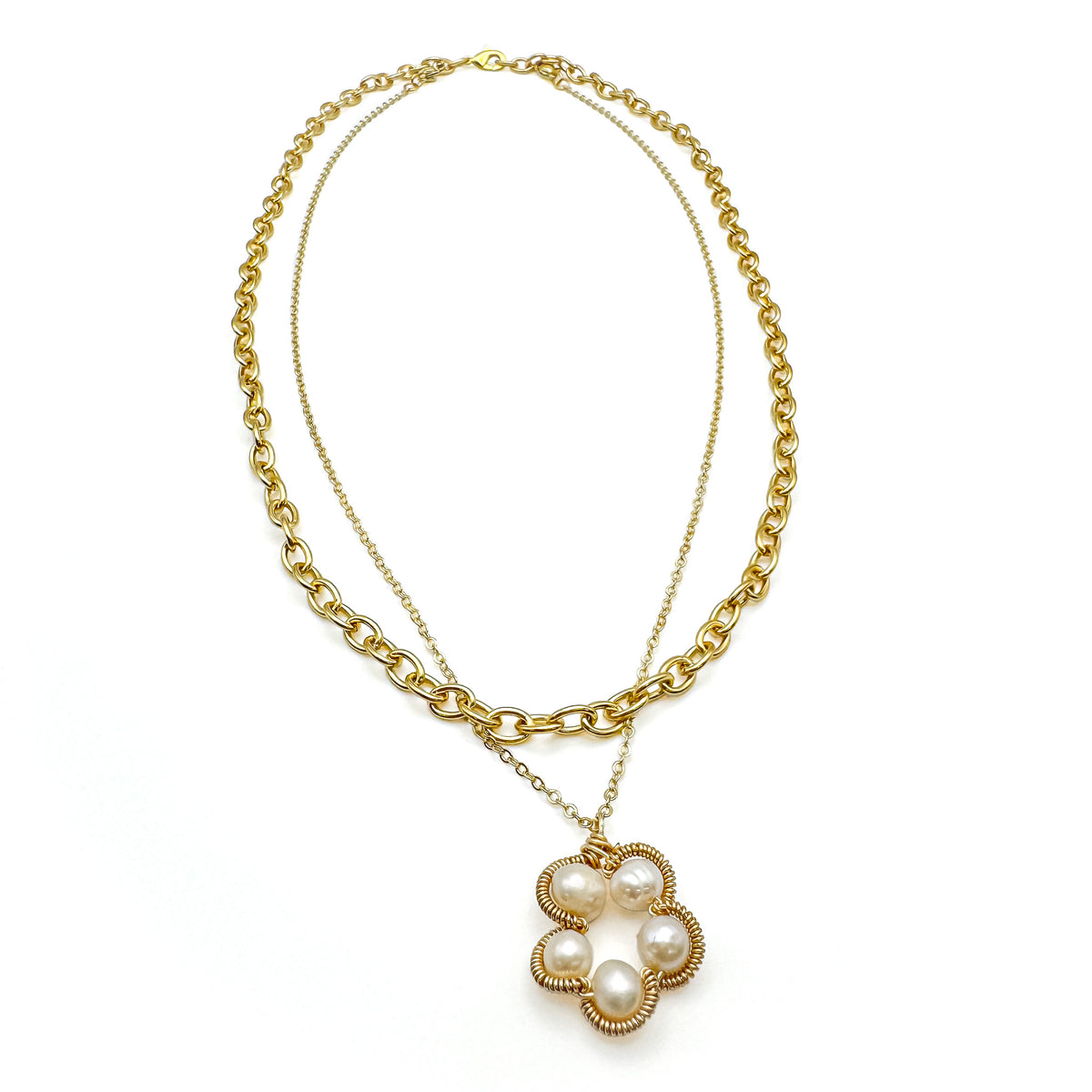Gold multi-strand necklace with chain strand and pearl flower pendant