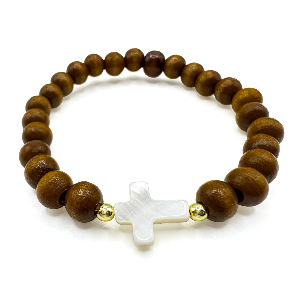 Beaded wood and gold stretch bracelet with mother of pearl cross charm