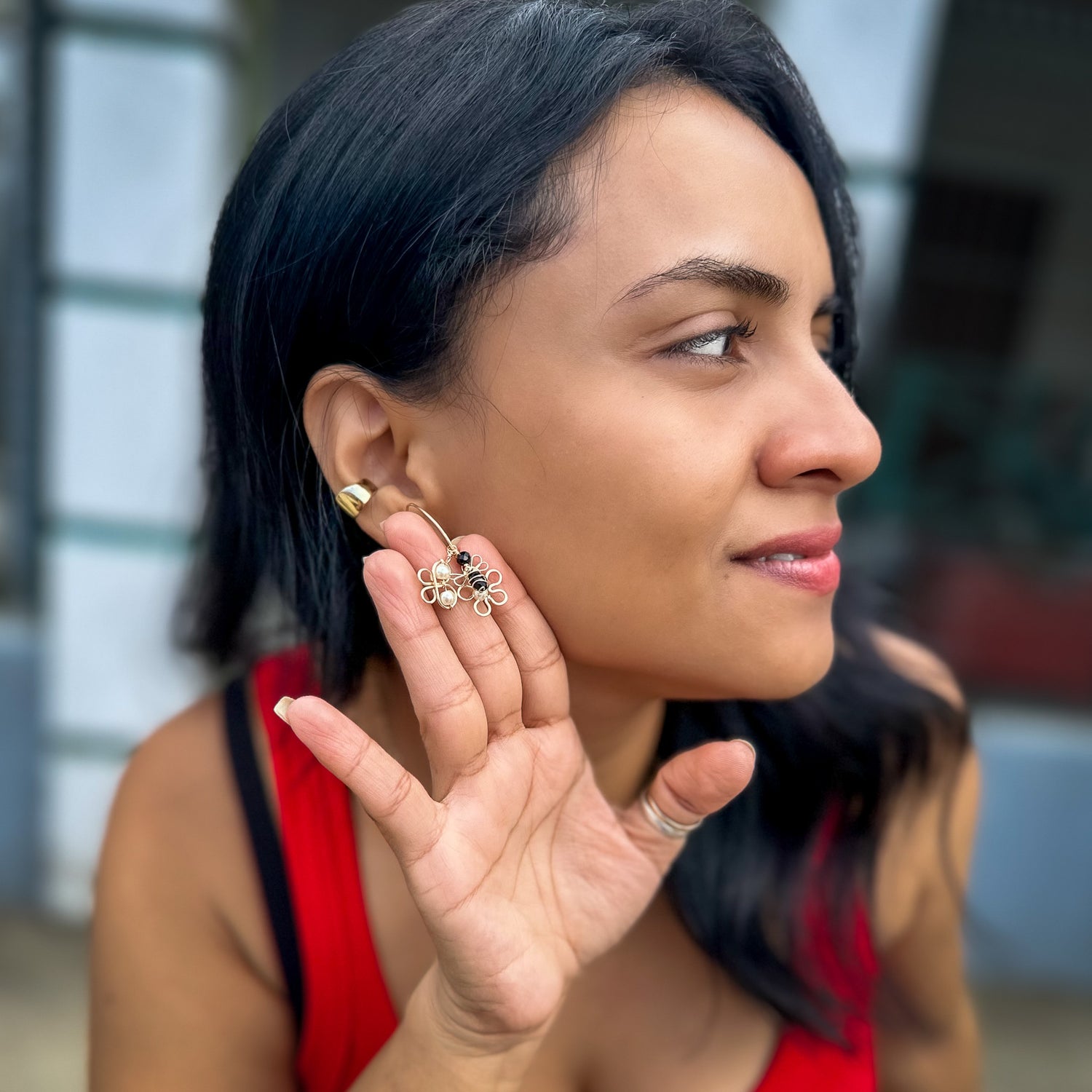 Charmed gold hoop earrings with interchangeable charms