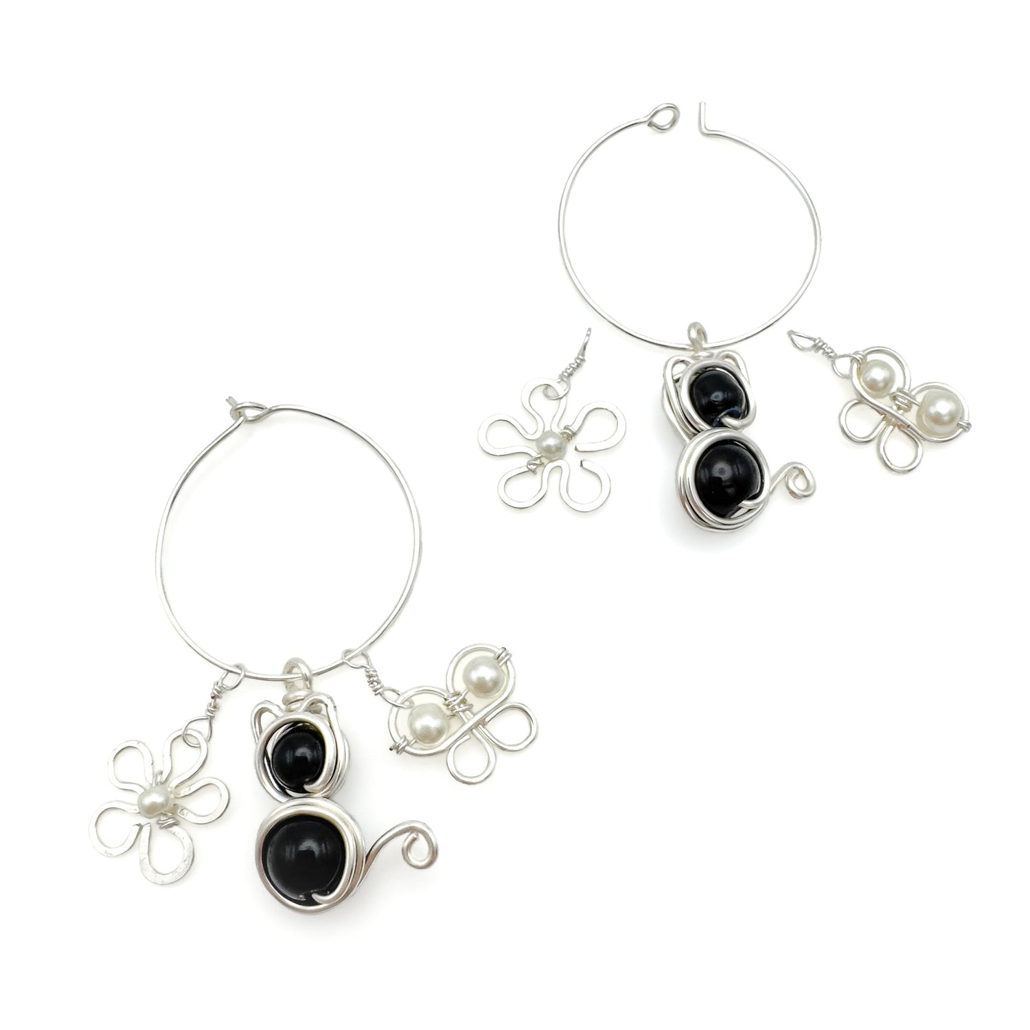 Charmed silver hoop earrings with interchangeable charms