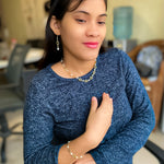 Gold pearl chain jewelry modeled