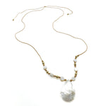 Long adjustable tan cord necklace with gold and mother of pearl beads and teardrop mother of pearl pendant