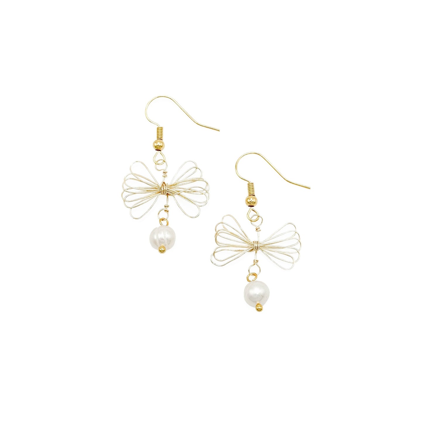 Gold pearl bow Artisan earrings