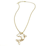 Long gold necklace with wire-wrapped gold and pearl dolphin pendant
