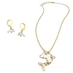 Small mother of pearl dolphin earrings and long gold necklace with wire-wrapped gold and pearl dolphin pendant