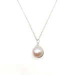 Pearl necklace on a white background