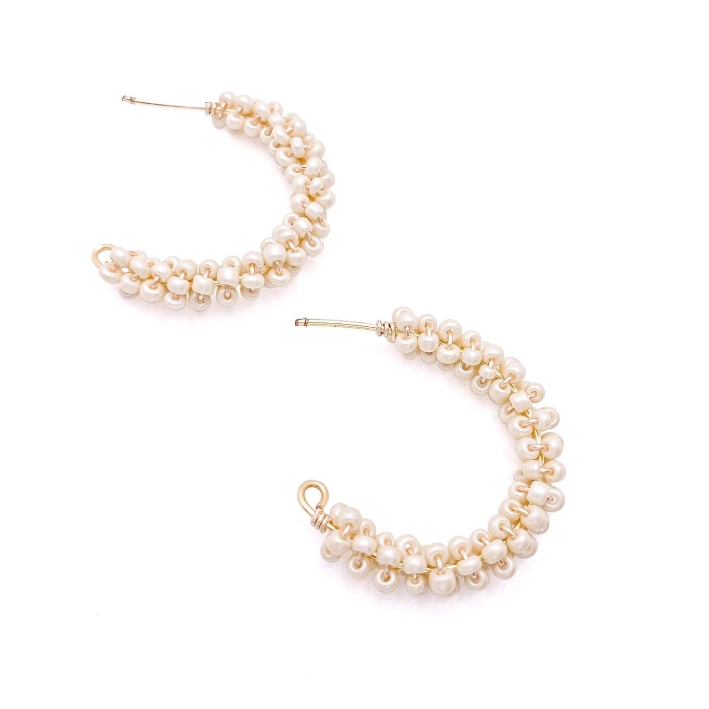 Pearlescent bead gold crescent earrings