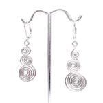 Silver swirl snowman winter earrings
