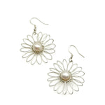 Large silver and pearl flower dangle earrings with intricate wirework petals