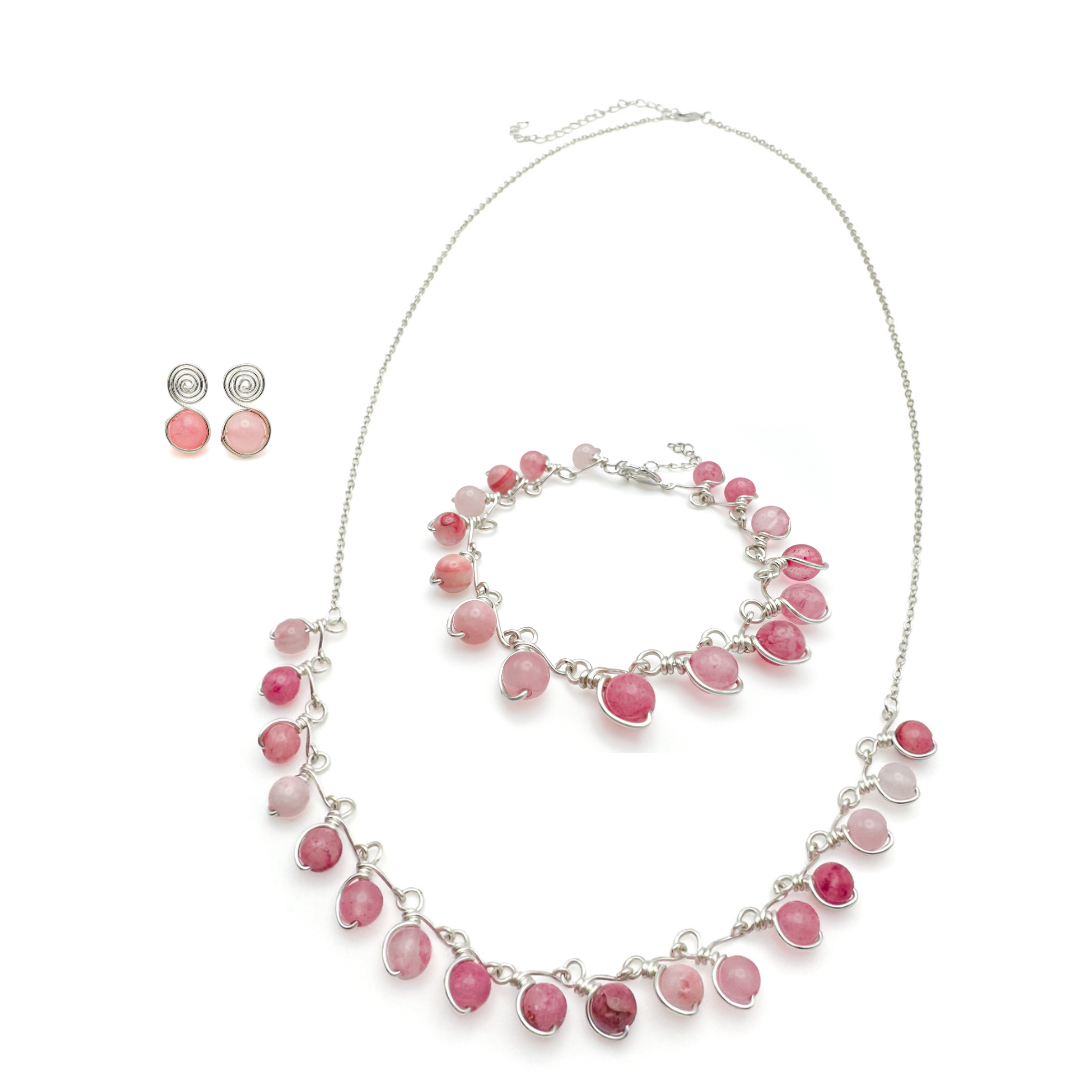 Close up of pink agate beaded silver jewelry set