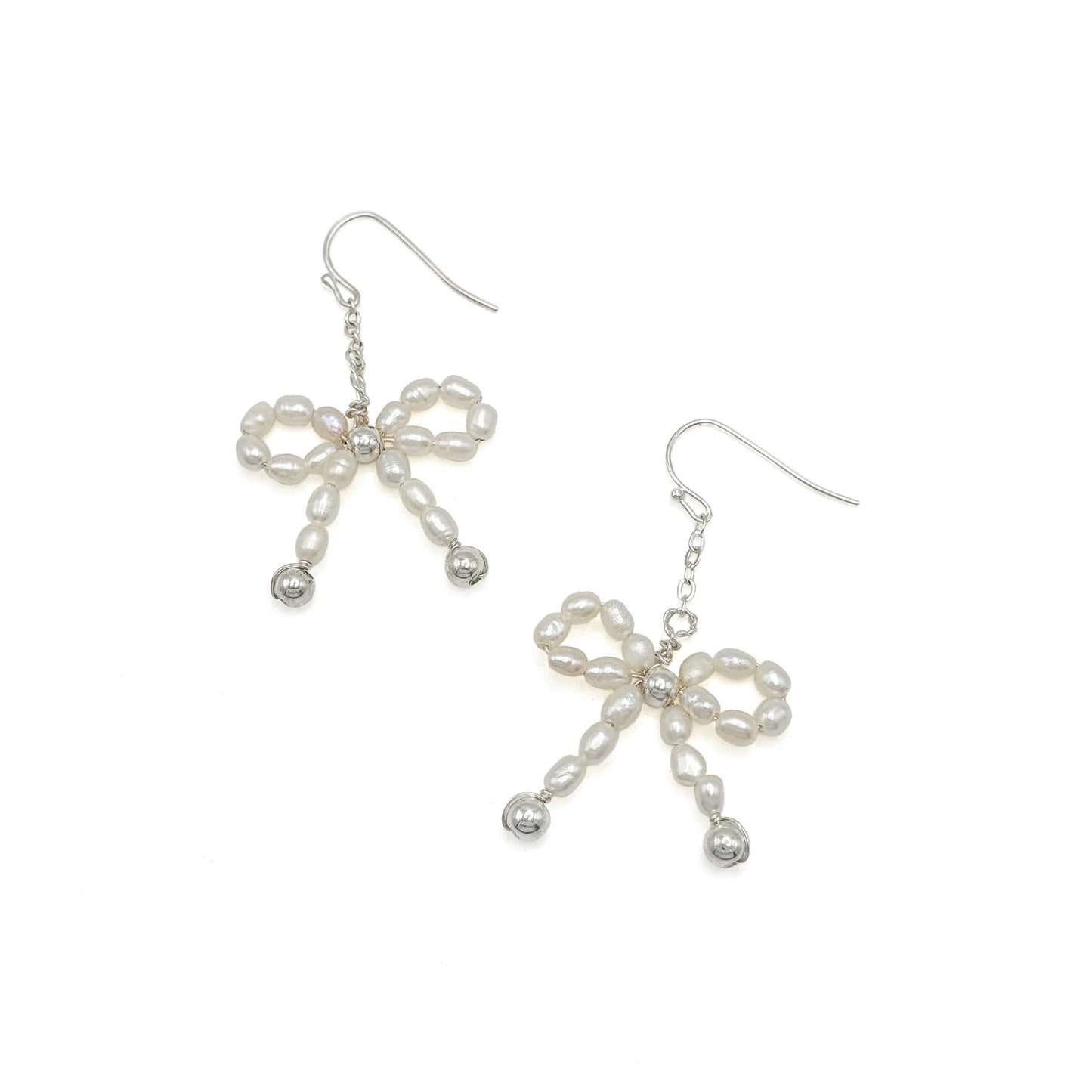 Pearl silver ribbon bow earrings