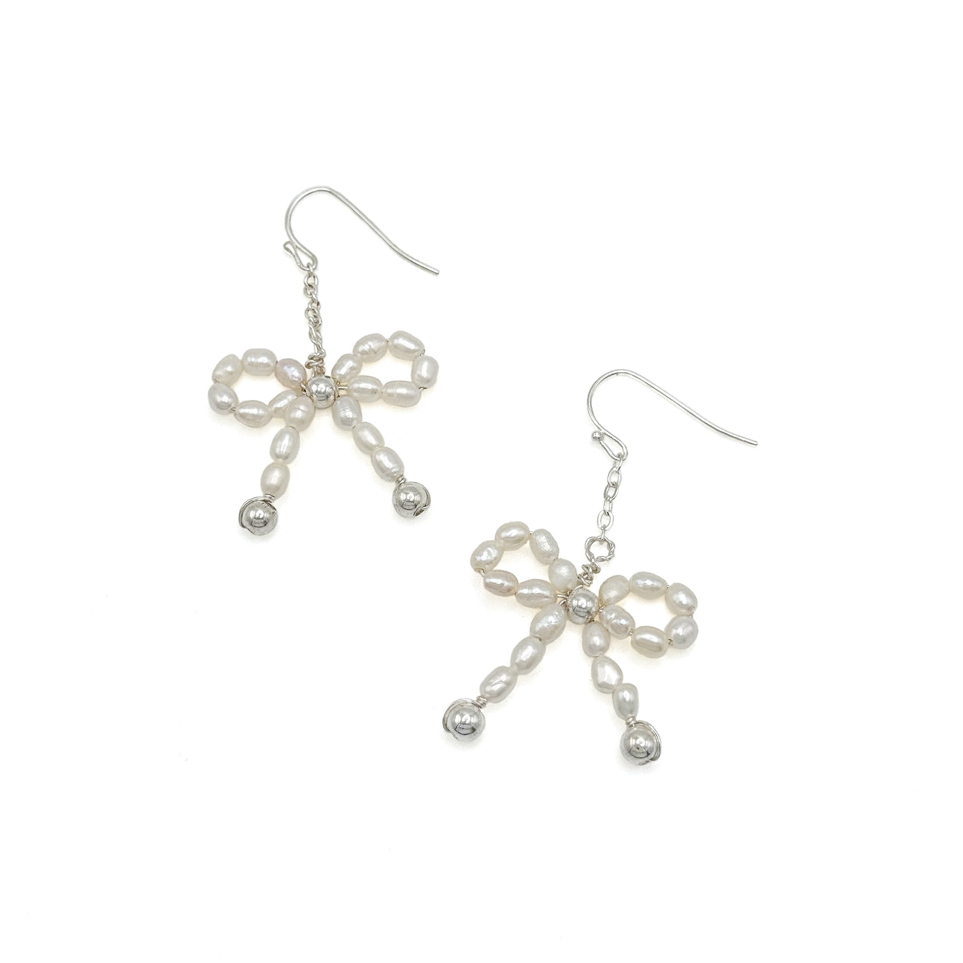 Pearl silver ribbon bow earrings