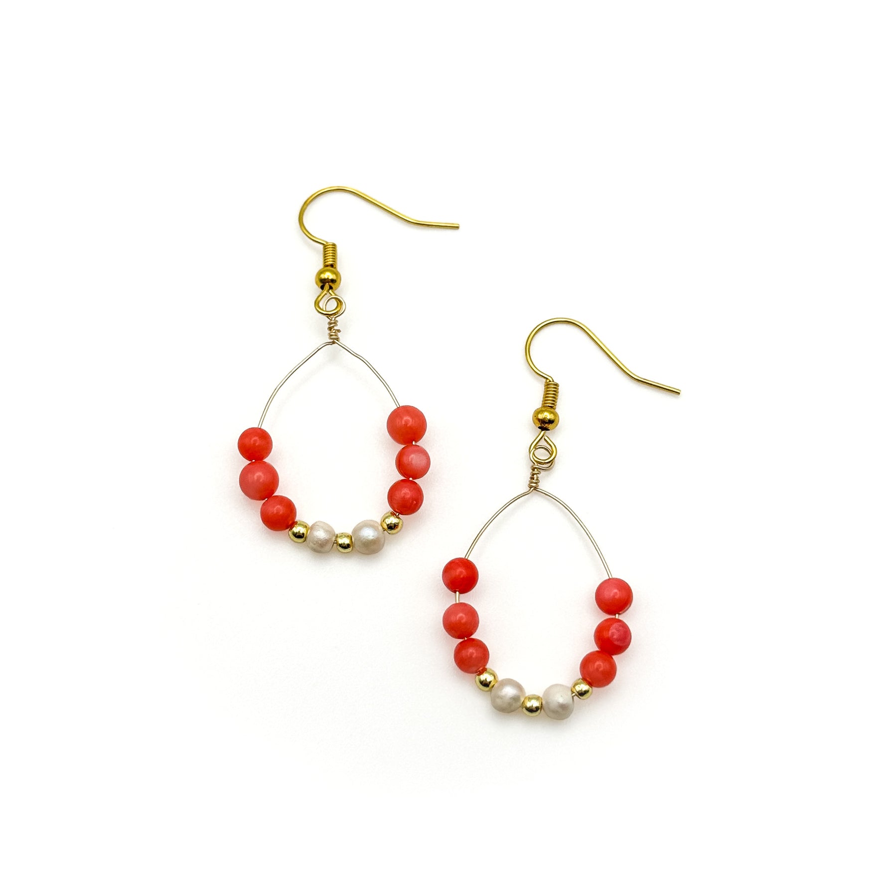 Gold teardrop dangle earrings with coral agate, gold, and freshwater pearl beads