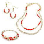Coral agate, freshwater pearl, and gold jewelry set including memory wire beaded bangle bracelet, teardrop dangle earrings, and multistrand beaded and chain necklace
