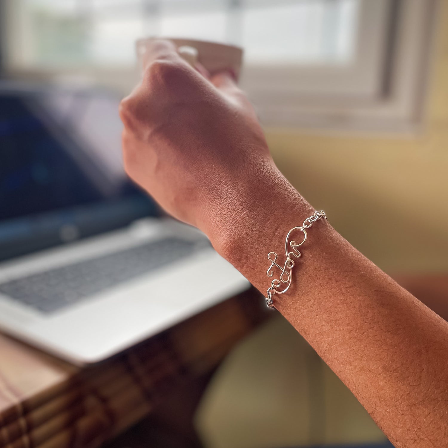 Love silver wire word bracelet