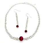 Long silver chain dangle earrings ending in pink agate and chain choker necklace with pink agate bead