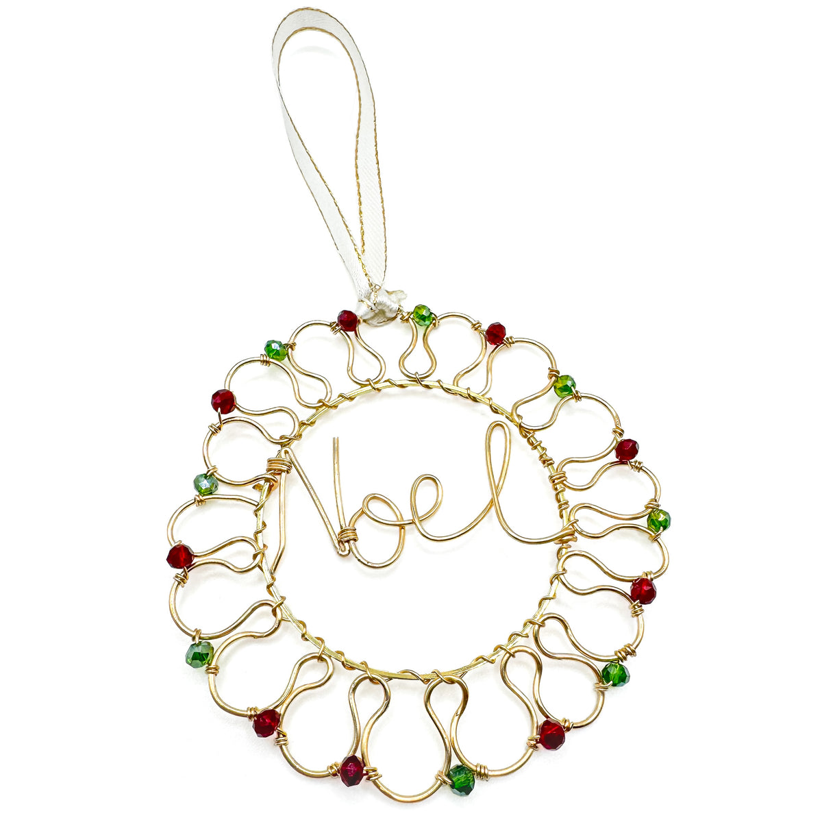 Gold wire-wrapped wreath ornament with red and green crystal adornments and wire-wrapped word Noel in the center