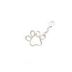 Silver paw print charm on a white background