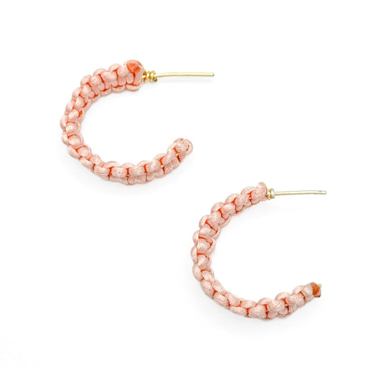 Pink woven gold earrings