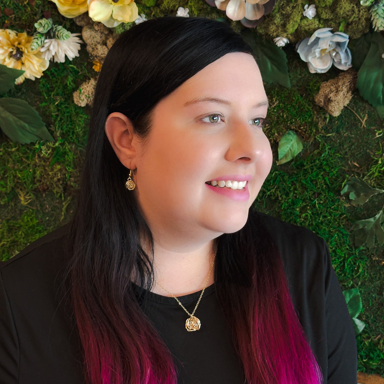 Gold rose flower jewelry modeled