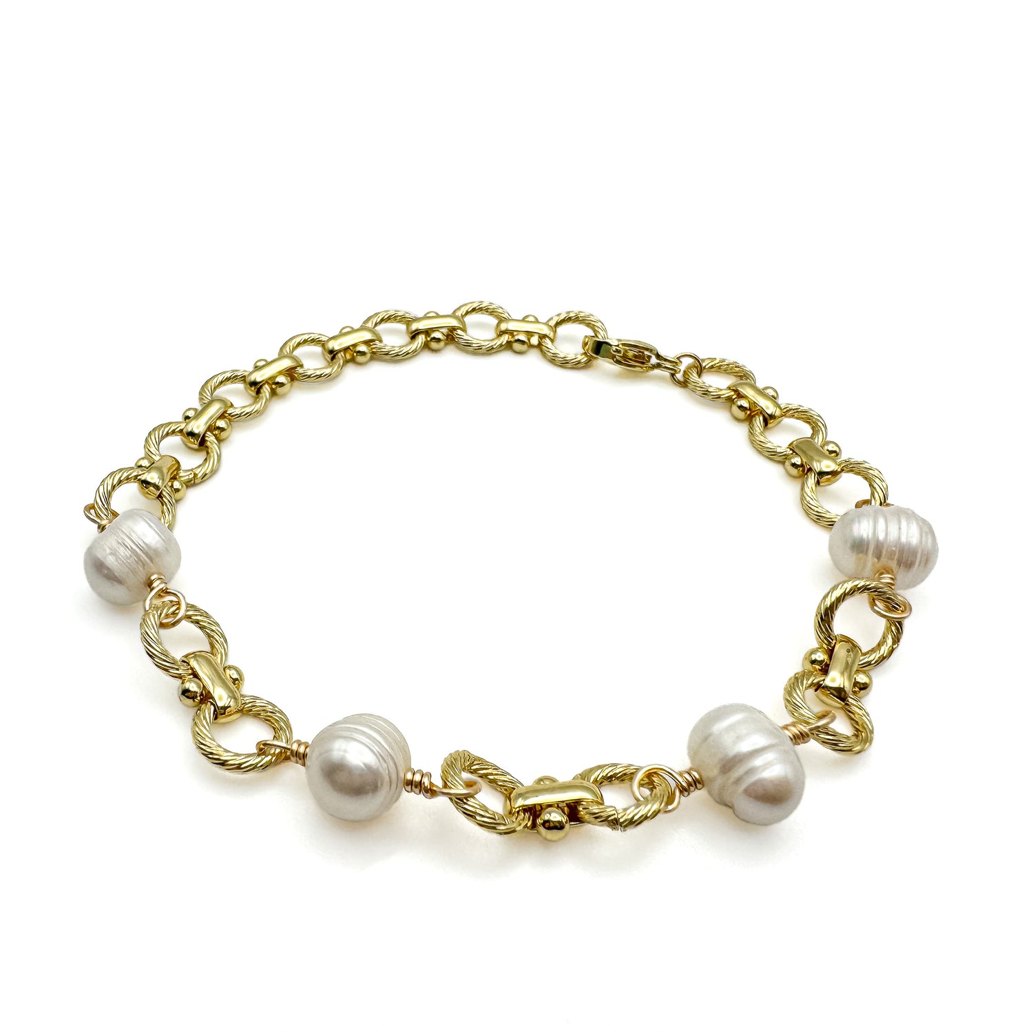 Gold twisted rope chain bracelet with freshwater pearl stations