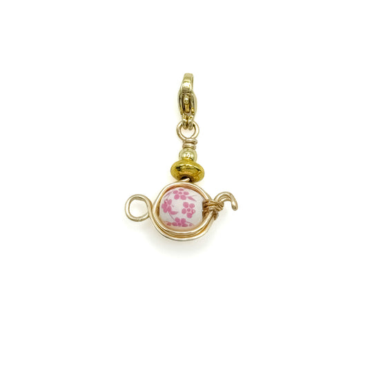 Tea gold charm