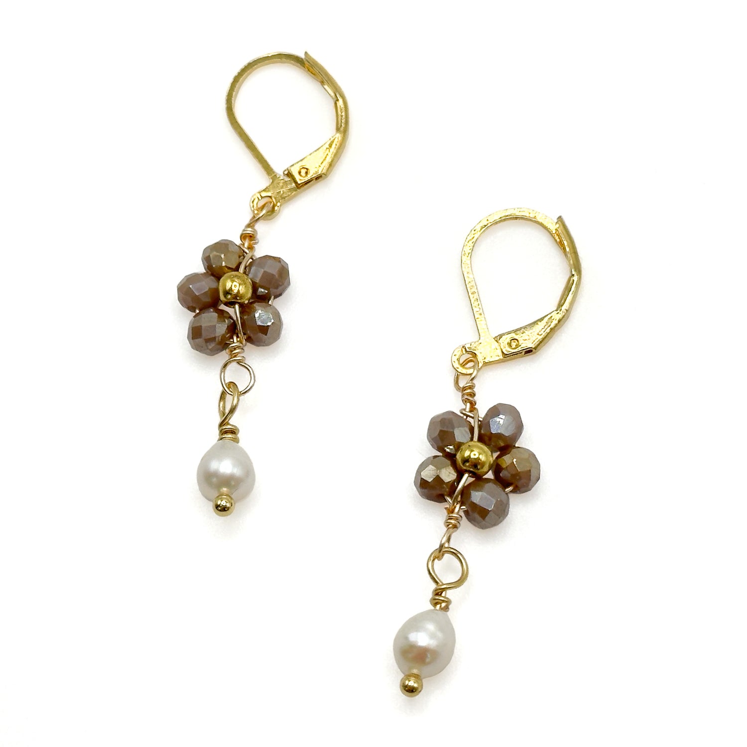 Gold leverback dangle earrings with brown crystal flowers ending in freshwater pearl drop