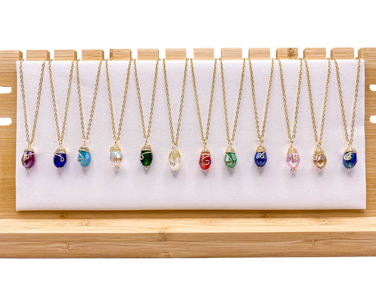 March gold necklace