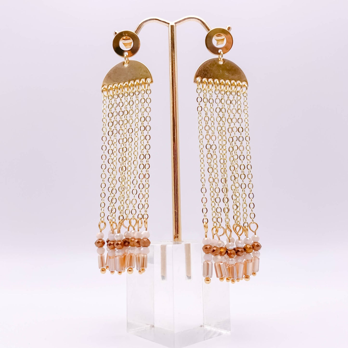 Neutral crystal gold tassel earrings