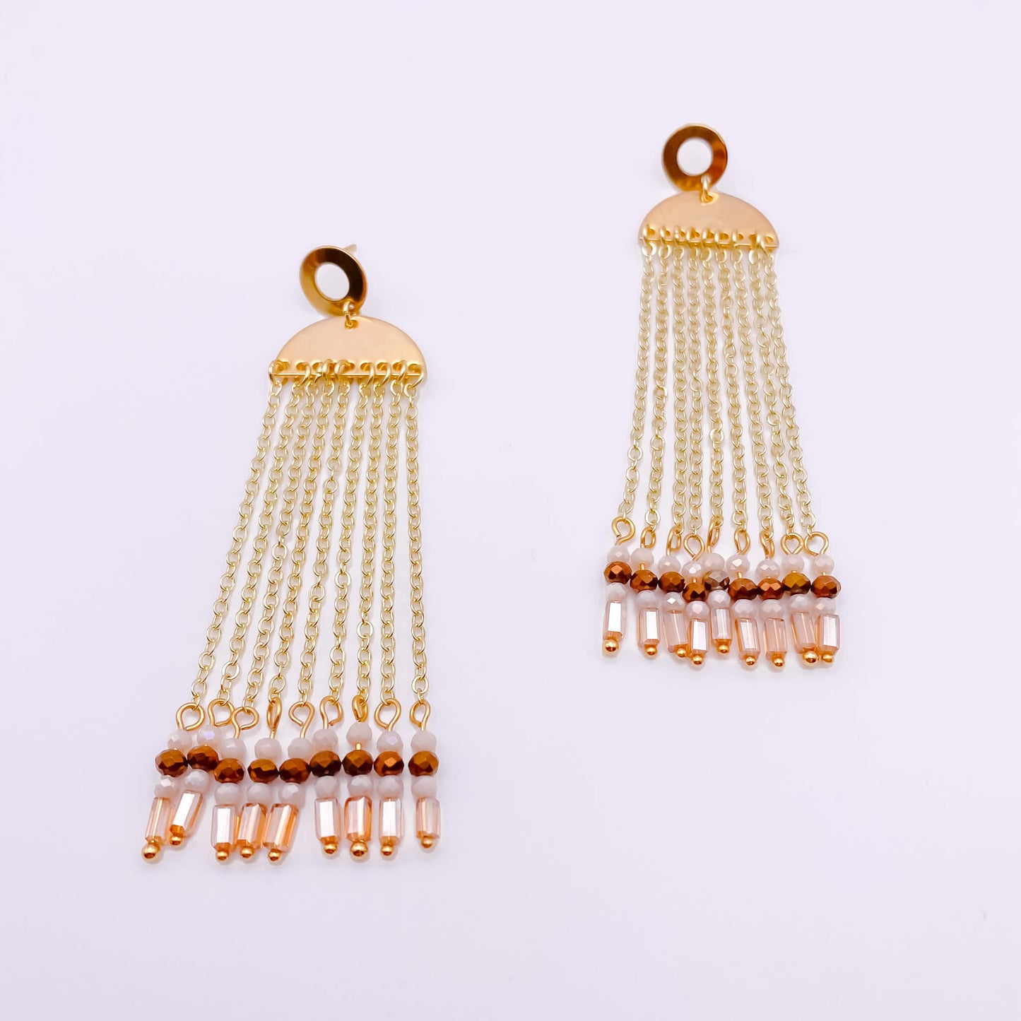 Neutral crystal gold tassel earrings